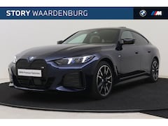 BMW i4 - M50 High Executive / Schuif-kanteldak / Trekhaak / M Adaptief onderstel / Adaptieve LED /