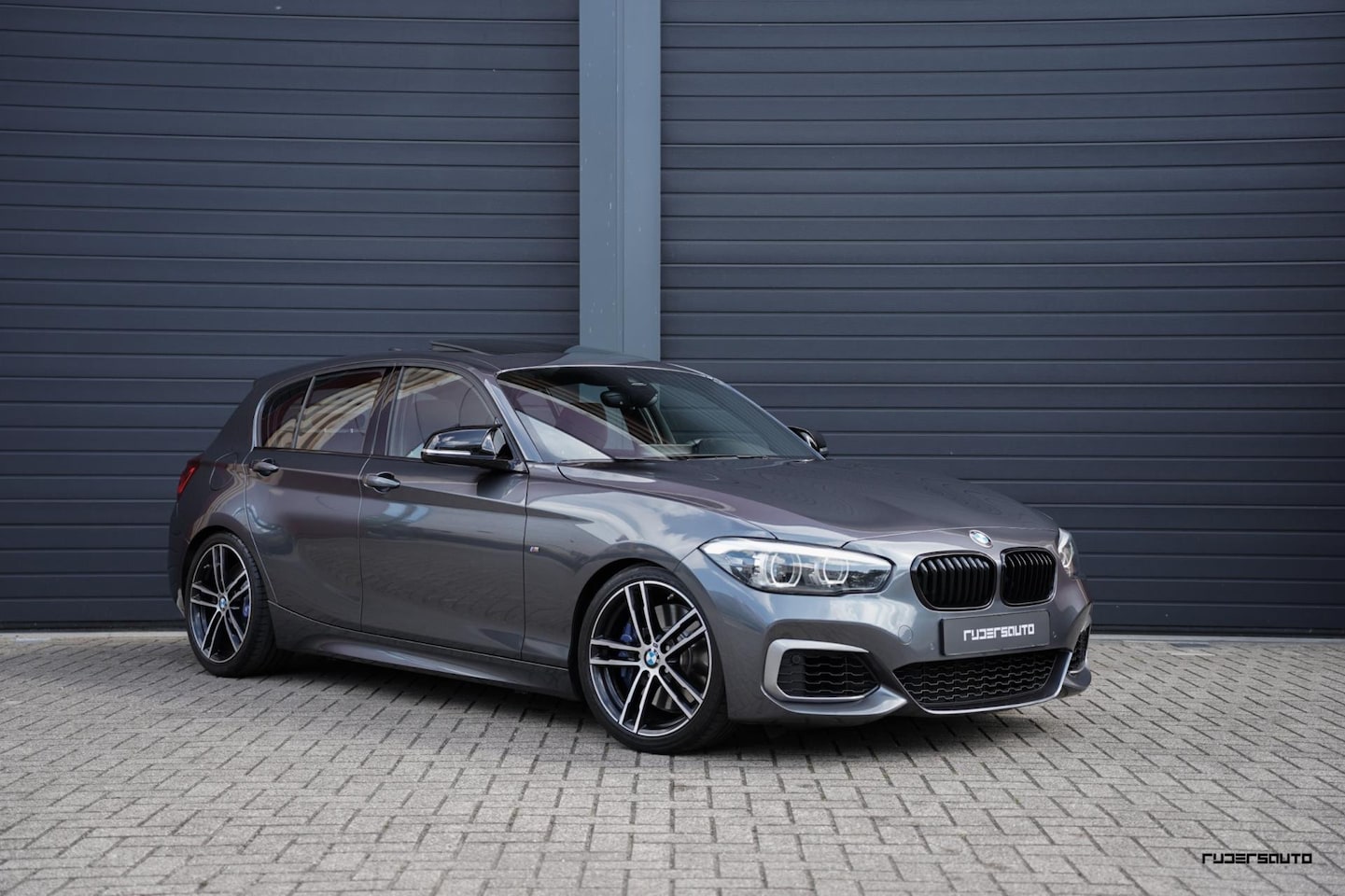 BMW 1-serie - M140i xDrive | Schuifdak | HK | Camera | Mosselman | OPF delete | H&R verlaagd | Stuurverw - AutoWereld.nl