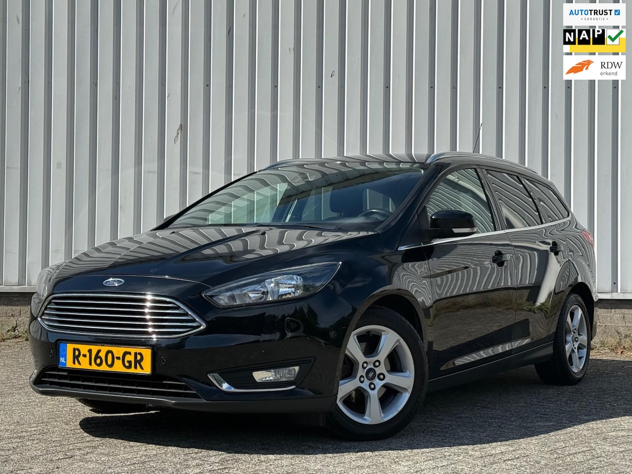 Ford Focus Wagon - 1.0 Titanium 1.0 Titanium 125PK,Trekhaak,Climate,Navi,Camera,Cruise,PDC,DealerOnderhouden! - AutoWereld.nl