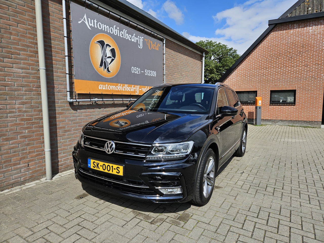 Volkswagen Tiguan - 2.0 TSI 4Motion Highline 2.0 TSI 4Motion Highline - AutoWereld.nl