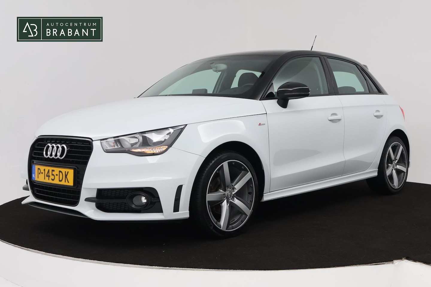 Audi A1 Sportback - 1.2 TFSI Ambition Pro Line Business (STOELVERWARMING, NAVIGATIE, BLUETOOTH, PARKEERSENSORE - AutoWereld.nl