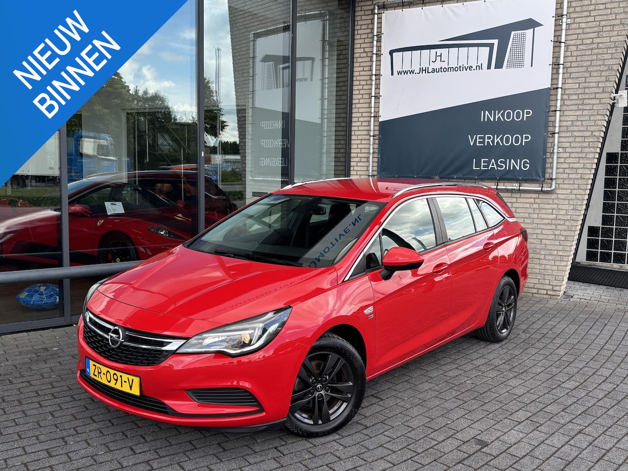 Opel Astra Sports Tourer - 1.0 Turbo 120 Jaar Edition*A/C*NAVI*CRUISE* - AutoWereld.nl