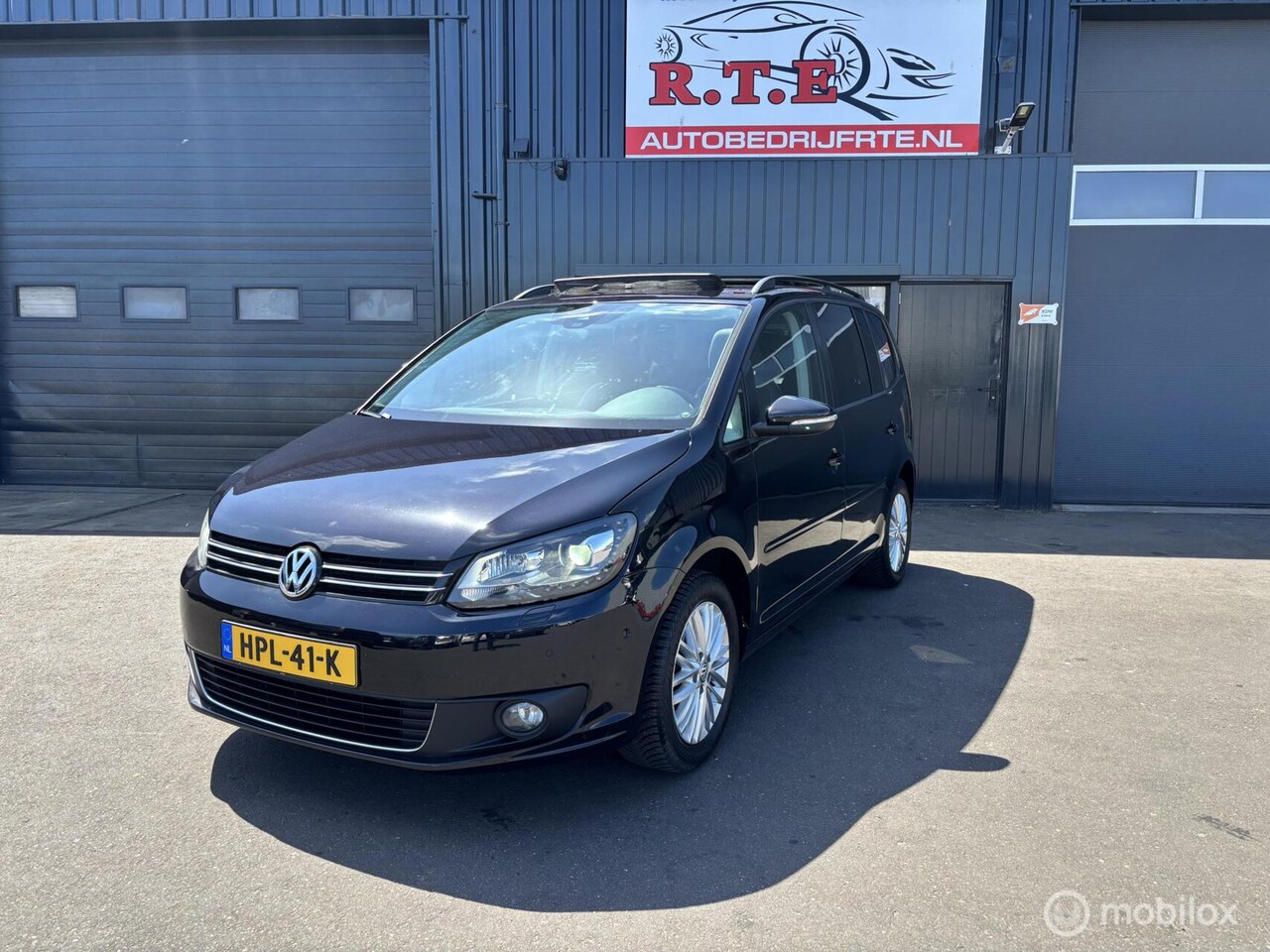 Volkswagen Touran - 1.4 TSI Highline 7p. Full options - AutoWereld.nl