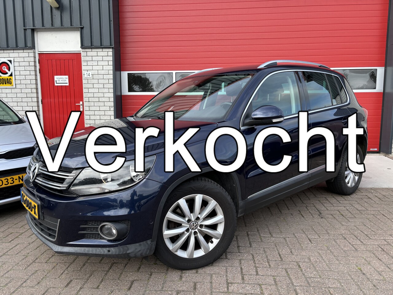 Volkswagen Tiguan - 1.4 TSI Sport&Style TREKHAAK / NAVI / CLIMA / PDC / BLUETOOTH / CRUISE / NL-AUTO - AutoWereld.nl