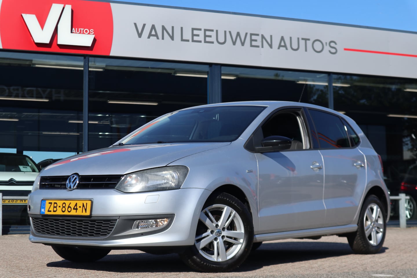 Volkswagen Polo - 1.2-12V BlueMotion Comfortline | Navigatie | Climate Control | 5Drs | Lichtmetalen Velgen - AutoWereld.nl