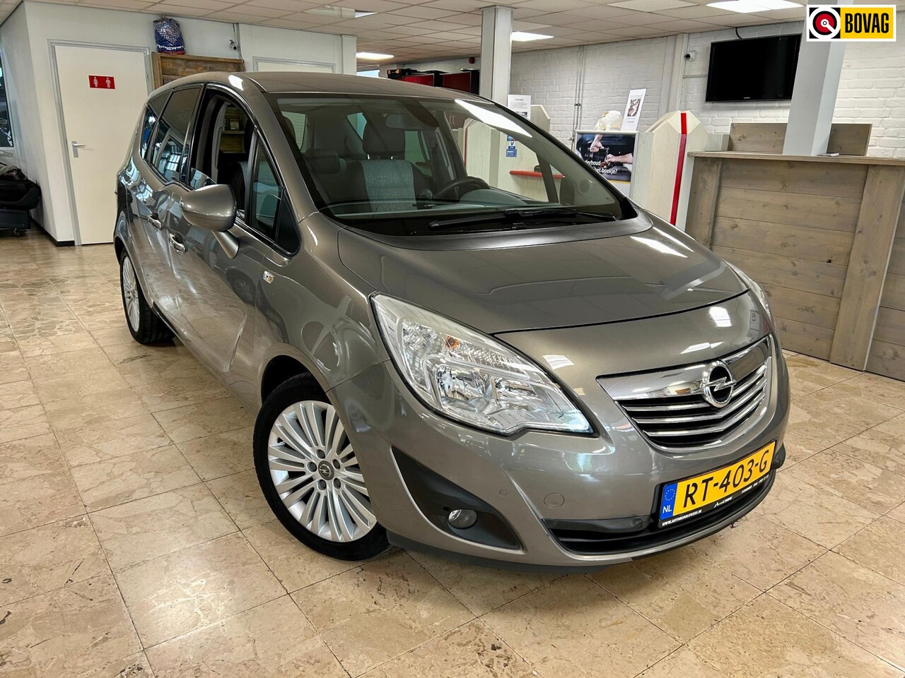 Opel Meriva - 1.4 Turbo Cosmo | Clima | Cruise | PDC V+A | Trekhaak - AutoWereld.nl