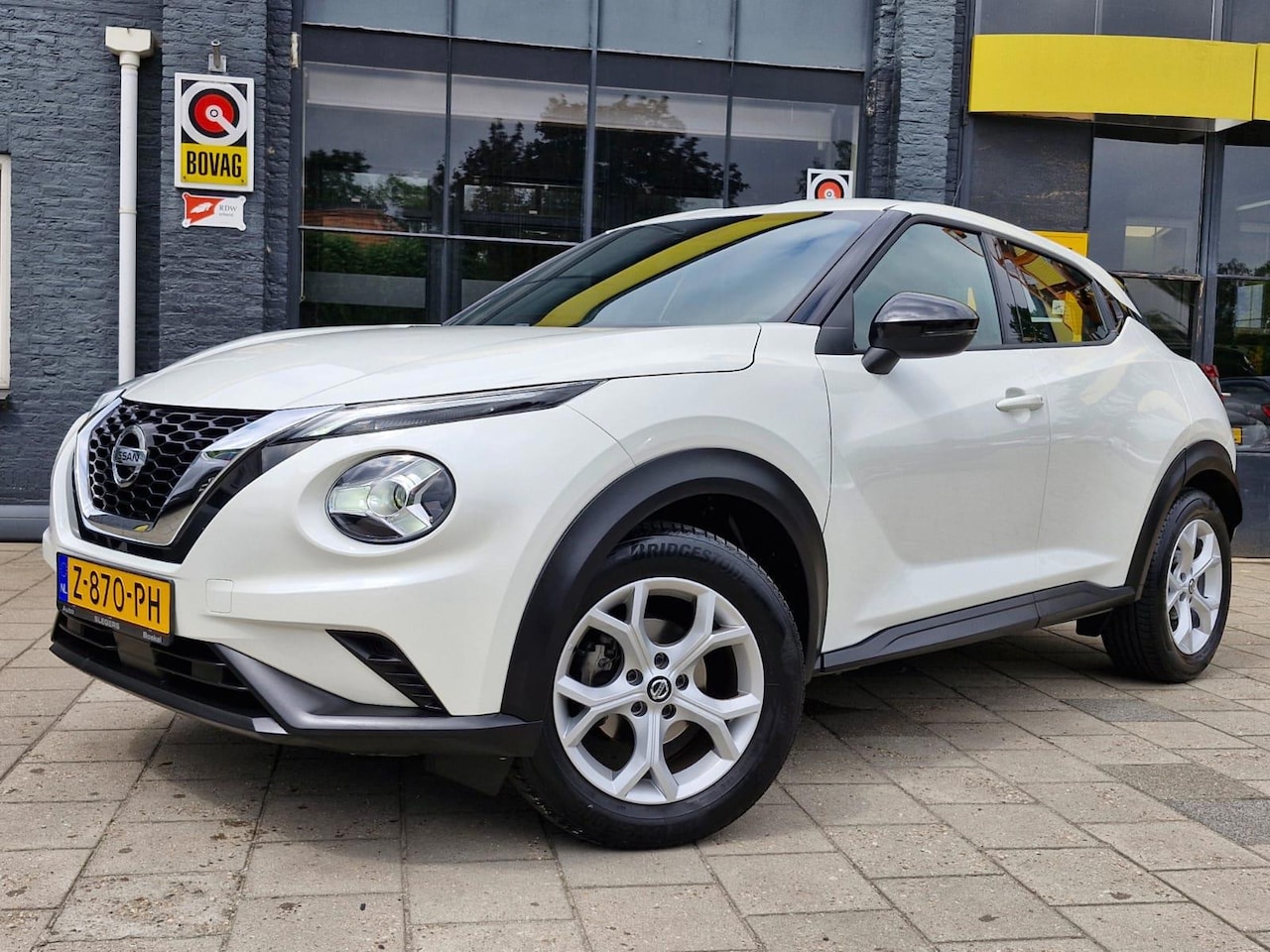 Nissan Juke - 1.0 DIG-T N-Connecta Automaat | Trekhaak | Camera | Stoelverwarming | Climate Control | Cr - AutoWereld.nl