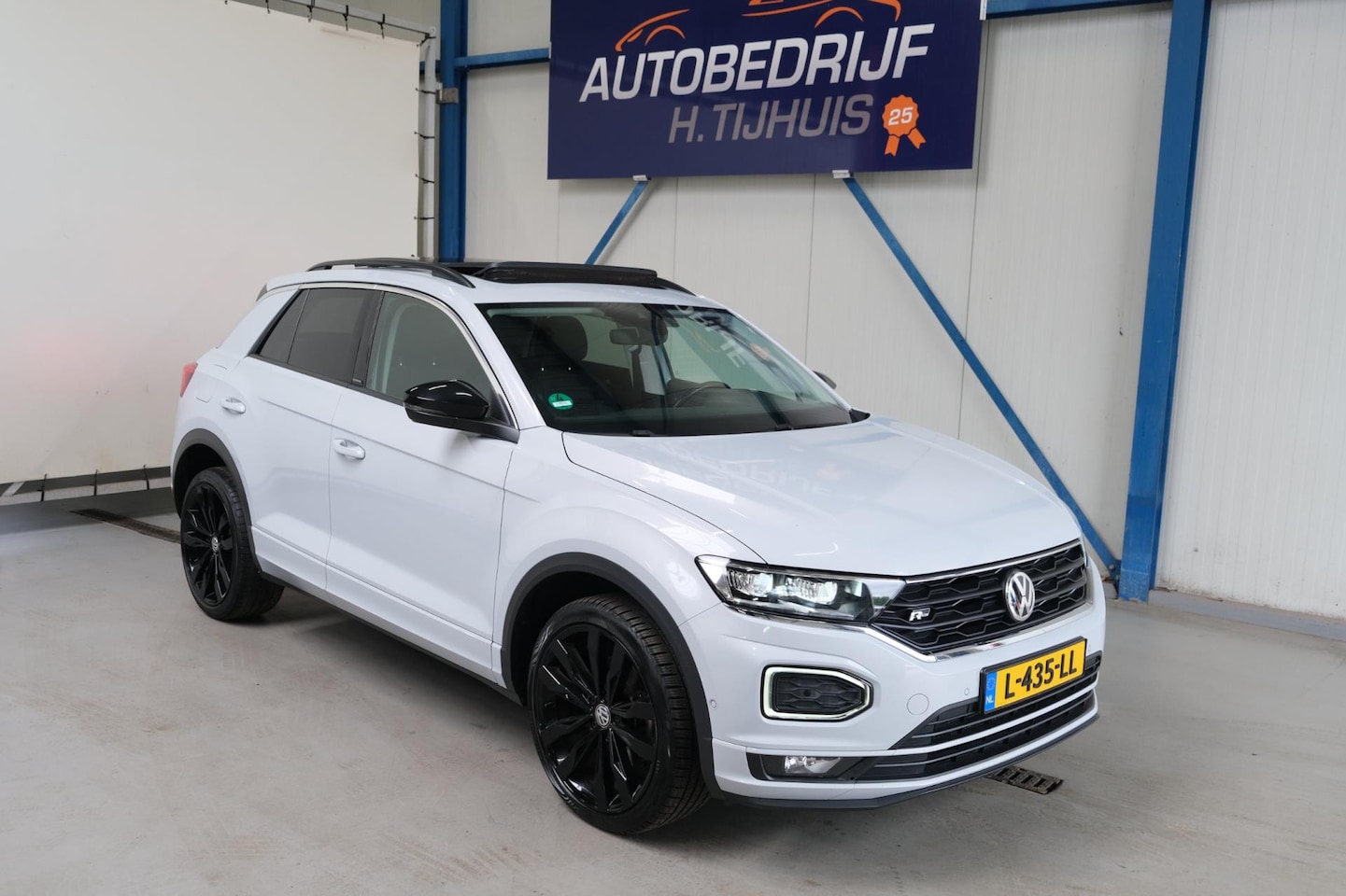 Volkswagen T-Roc - 1.5 TSI Sport Business R-Line Automaat - Airco, Cruise, Panodak, PDC, Stoelverwarming. - AutoWereld.nl