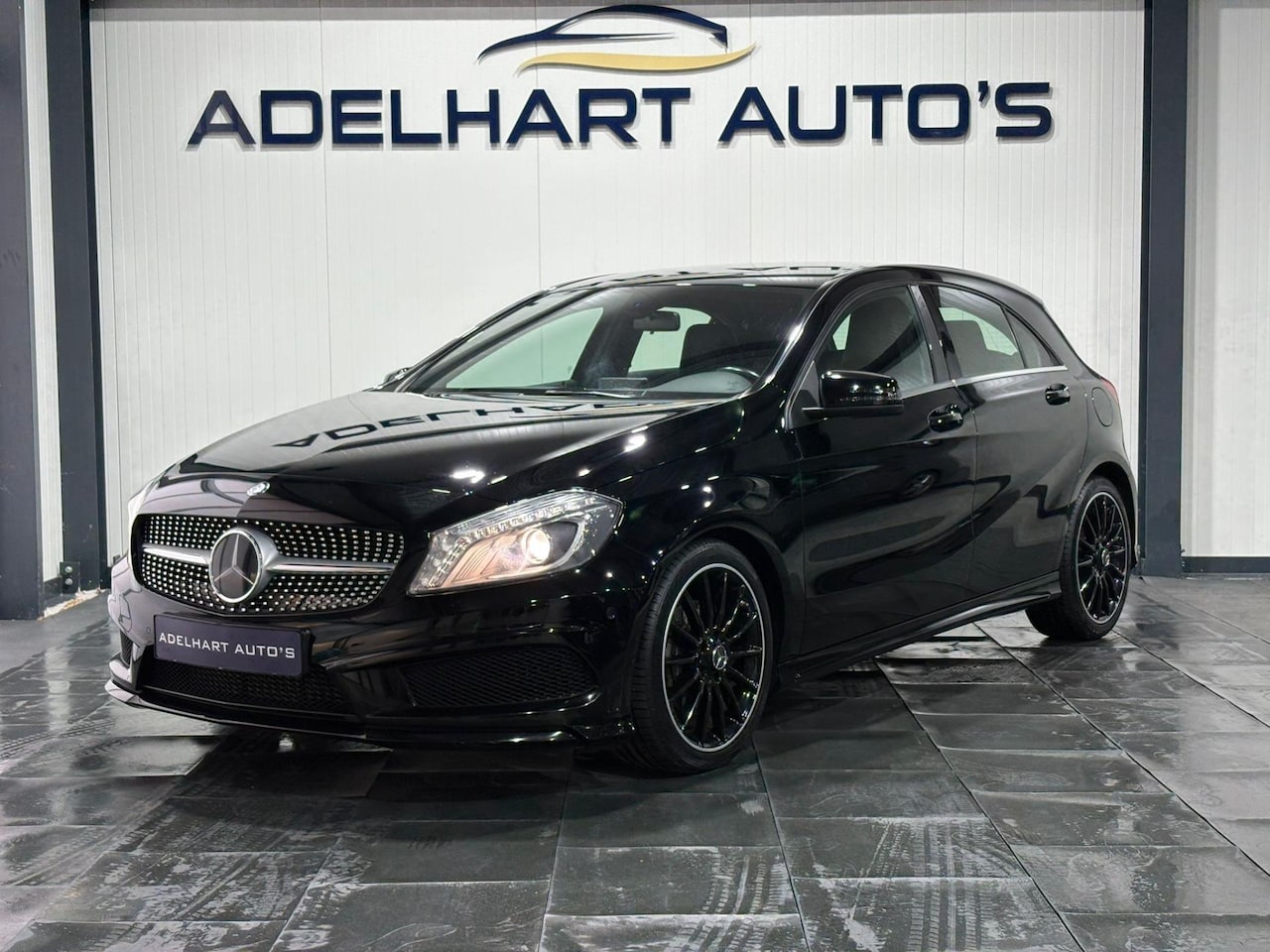 Mercedes-Benz A-klasse - 180 AMG Line Automaat / Navigatie full map / Cruise control / Climate Control / Stoelverwa - AutoWereld.nl