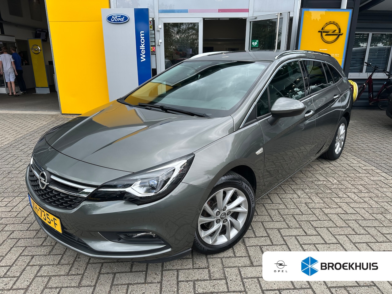 Opel Astra Sports Tourer - 1.4 150PK Innovation | TREKHAAK AFNEEMBAAR| AGR-COMFORTSTOELEN| CAMERA| PARKEERSENSOREN V+ - AutoWereld.nl