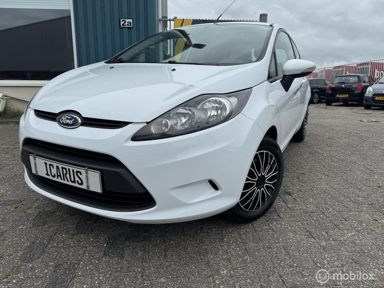 Ford Fiesta - 1.25 Limited new apk|airco|boekjes - AutoWereld.nl