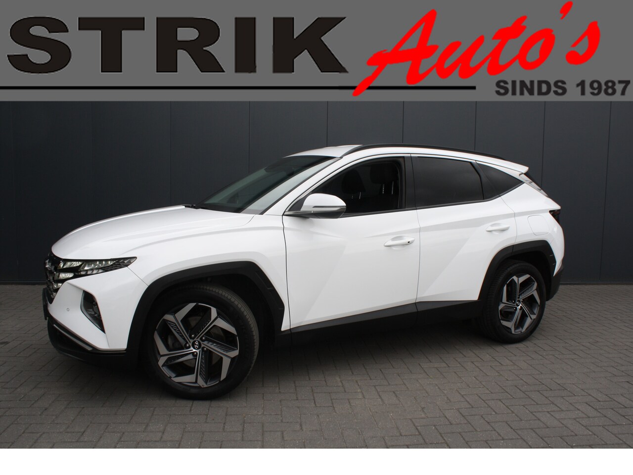 Hyundai Tucson - 1.6 T-GDI HEV Comfort - NAVIGATIE - AutoWereld.nl