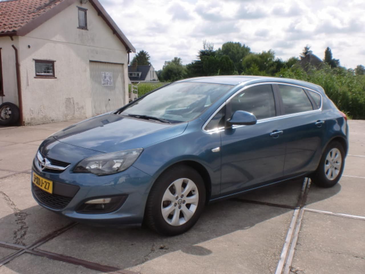 Opel Astra - 1.4 TURBO SPORT ECOTEC 88KW 5D BJ2014 LMV AIRCO NAP - AutoWereld.nl