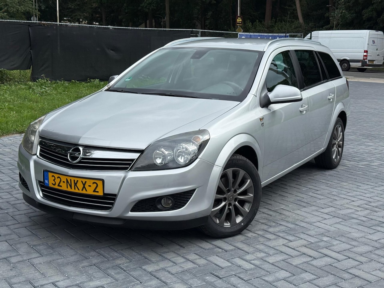Opel Astra Wagon - 1.6 Cosmo/Airco/Navi/Cruise/LMV/NAP - AutoWereld.nl