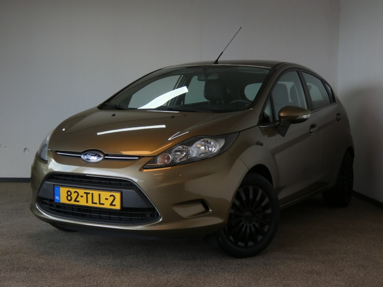 Ford Fiesta - 1.25 Limited Nwe APK airco - AutoWereld.nl