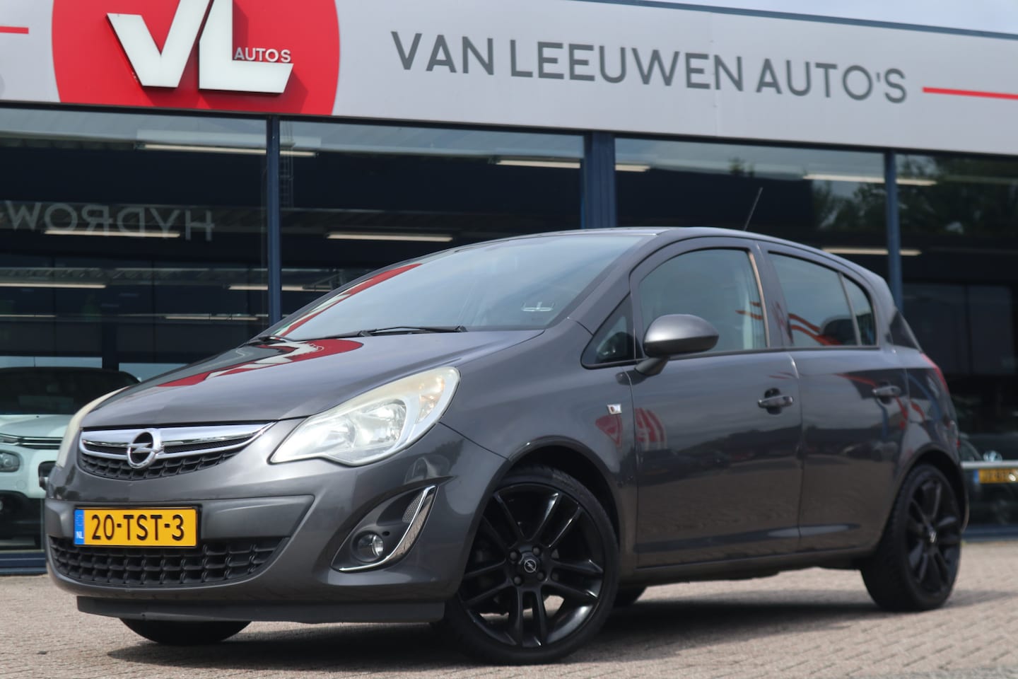 Opel Corsa - 1.2-16V Anniversary Edition | Half Leder | Airco | Cruise - AutoWereld.nl
