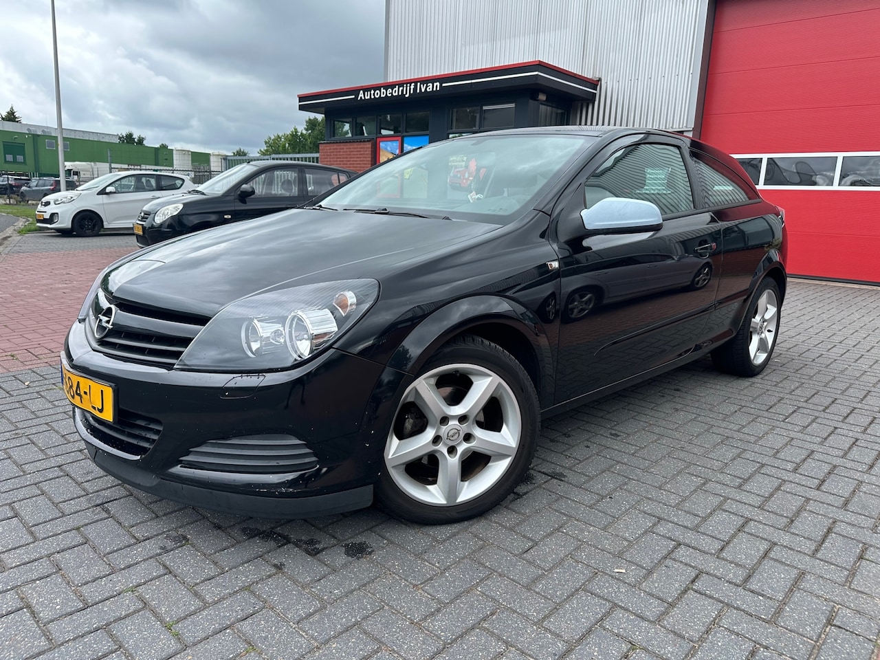 Opel Astra GTC - 1.6 Enjoy 1.6 Enjoy - AutoWereld.nl