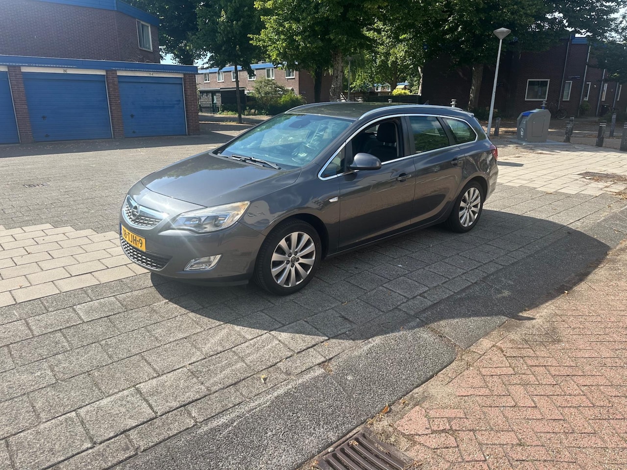 Opel Astra Sports Tourer - 1.4 Turbo Automaat Cosmo Cruise PDC - AutoWereld.nl