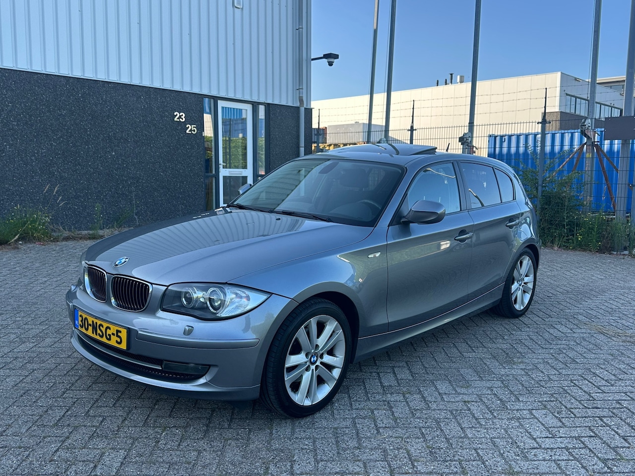 BMW 1-serie - 118i Automaat 2009 Schuifdak - AutoWereld.nl