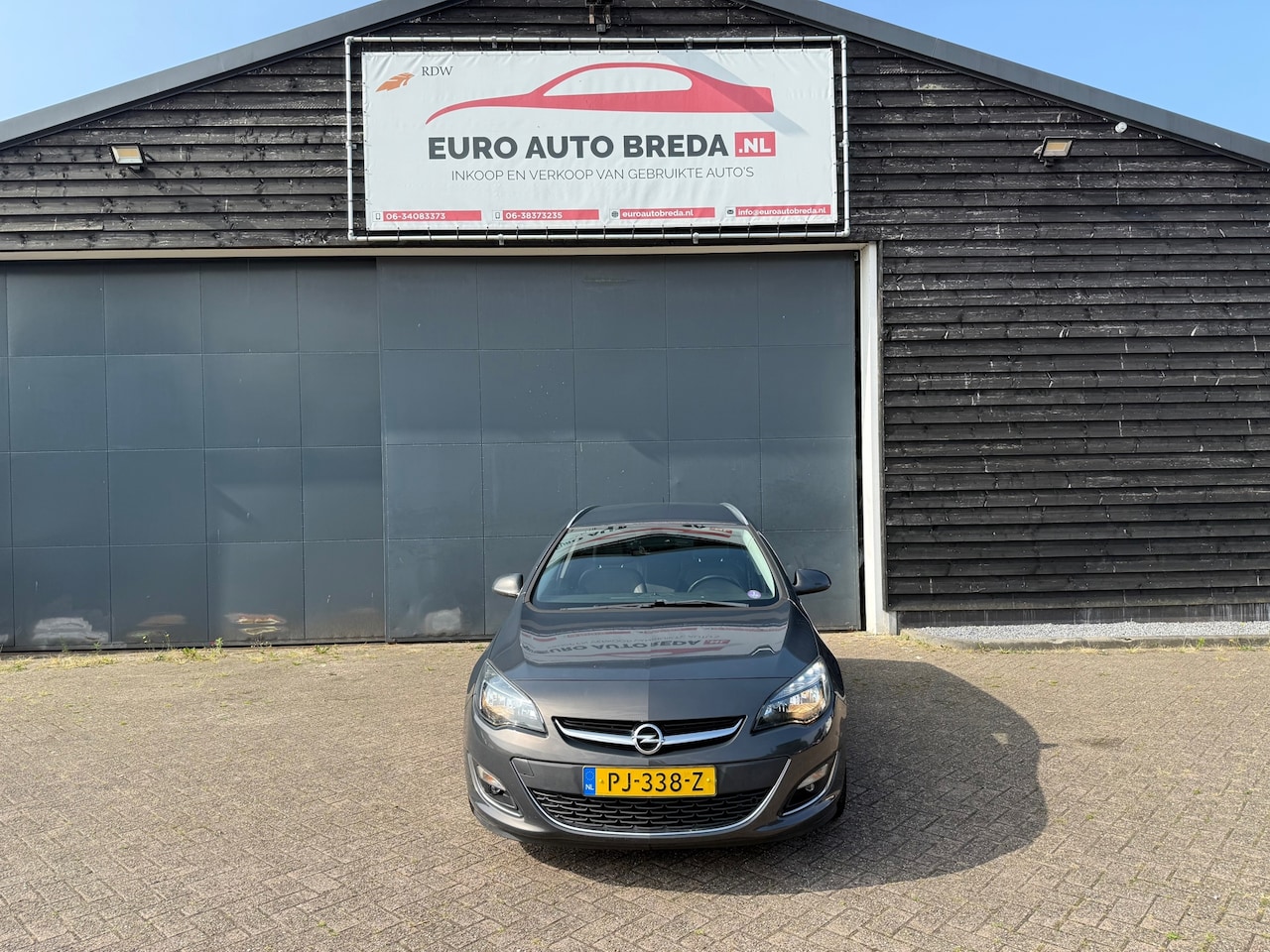 Opel Astra Sports Tourer - 1.4 Turbo Sport 1.4 Turbo Sport - AutoWereld.nl
