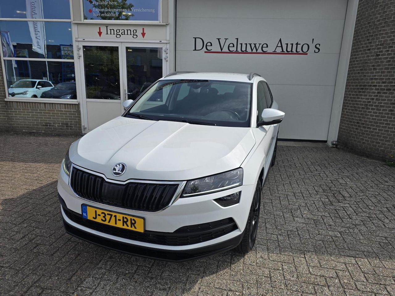 Skoda Karoq - 1.5 TSI ACT Style Business Carplay Trekhk Camera - AutoWereld.nl