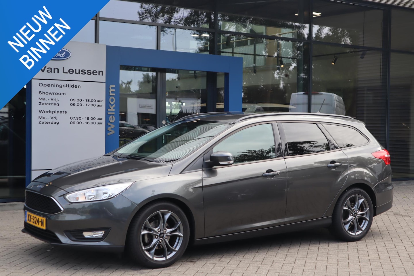 Ford Focus Wagon - 125PK ST-LINE TREKHAAK STOEL/STUUR/VOORRUITVERW. NAVI P-SENSOREN PRIVACY-GLASS - AutoWereld.nl