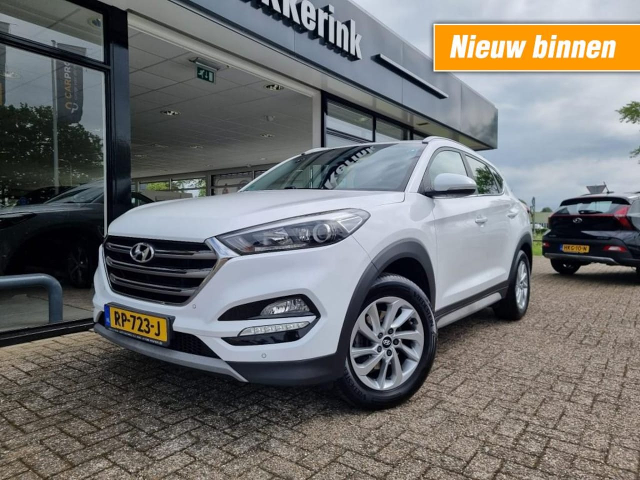 Hyundai Tucson - 1.6 GDI COMFORT NAVI/CLIMATE/TREKHAAK - AutoWereld.nl