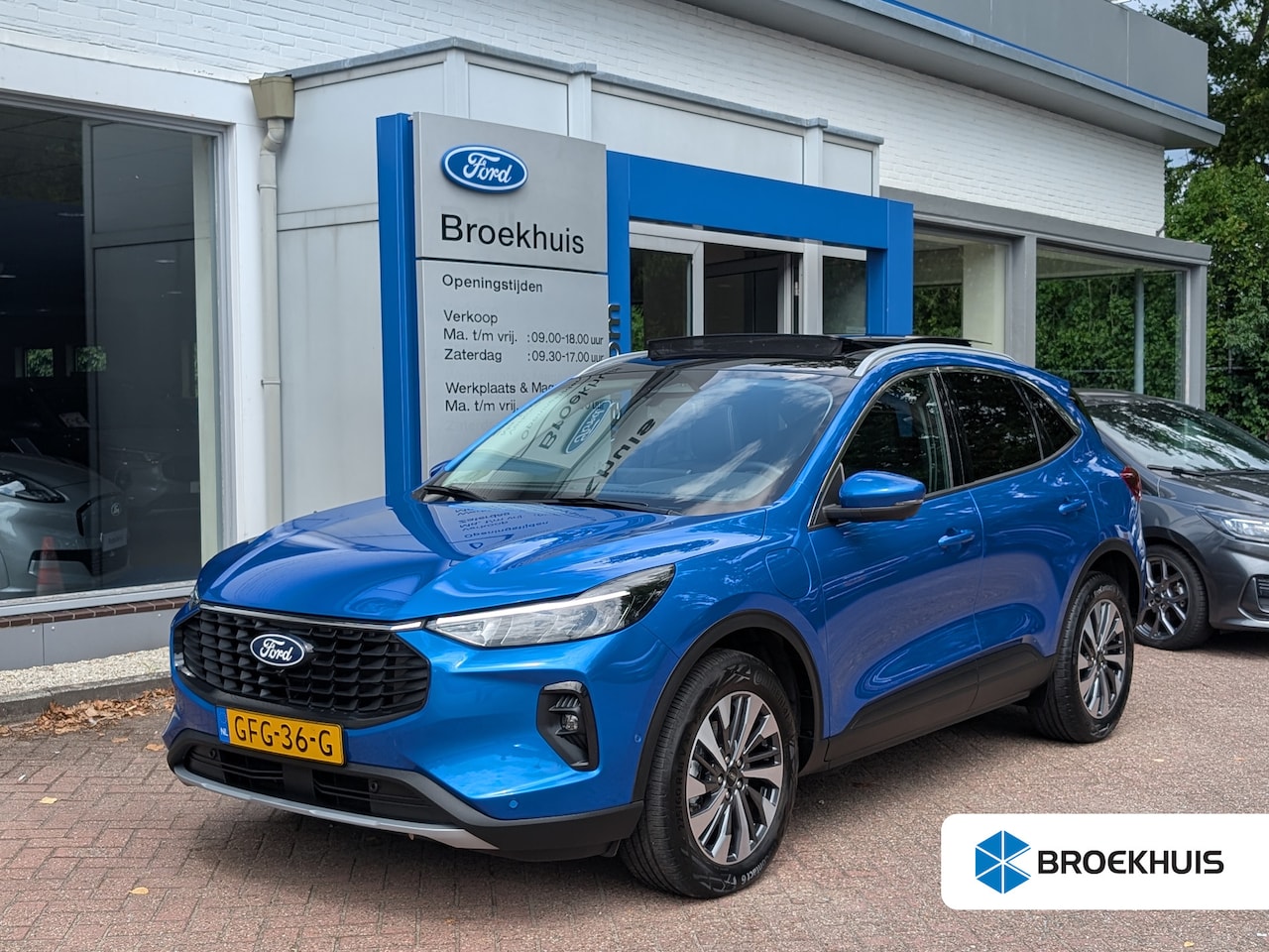 Ford Kuga - 2.5 PHEV Titanium 242pk | Carplay | Navi | Adap. Cruise | Keyless | Panoramadak | Voorruit - AutoWereld.nl