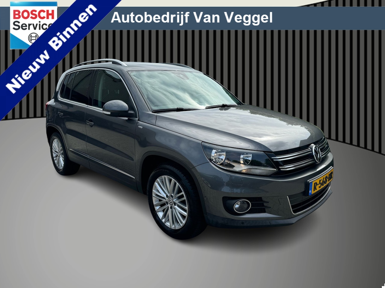 Volkswagen Tiguan - 1.4 TSI Sport&Style trekhaak, cruise, navi, automaat - AutoWereld.nl