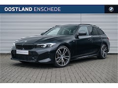 BMW 3-serie Touring - 318i High Executive M Sport Automaat / Panoramadak / Trekhaak / Sportstoelen / Stoelverwar