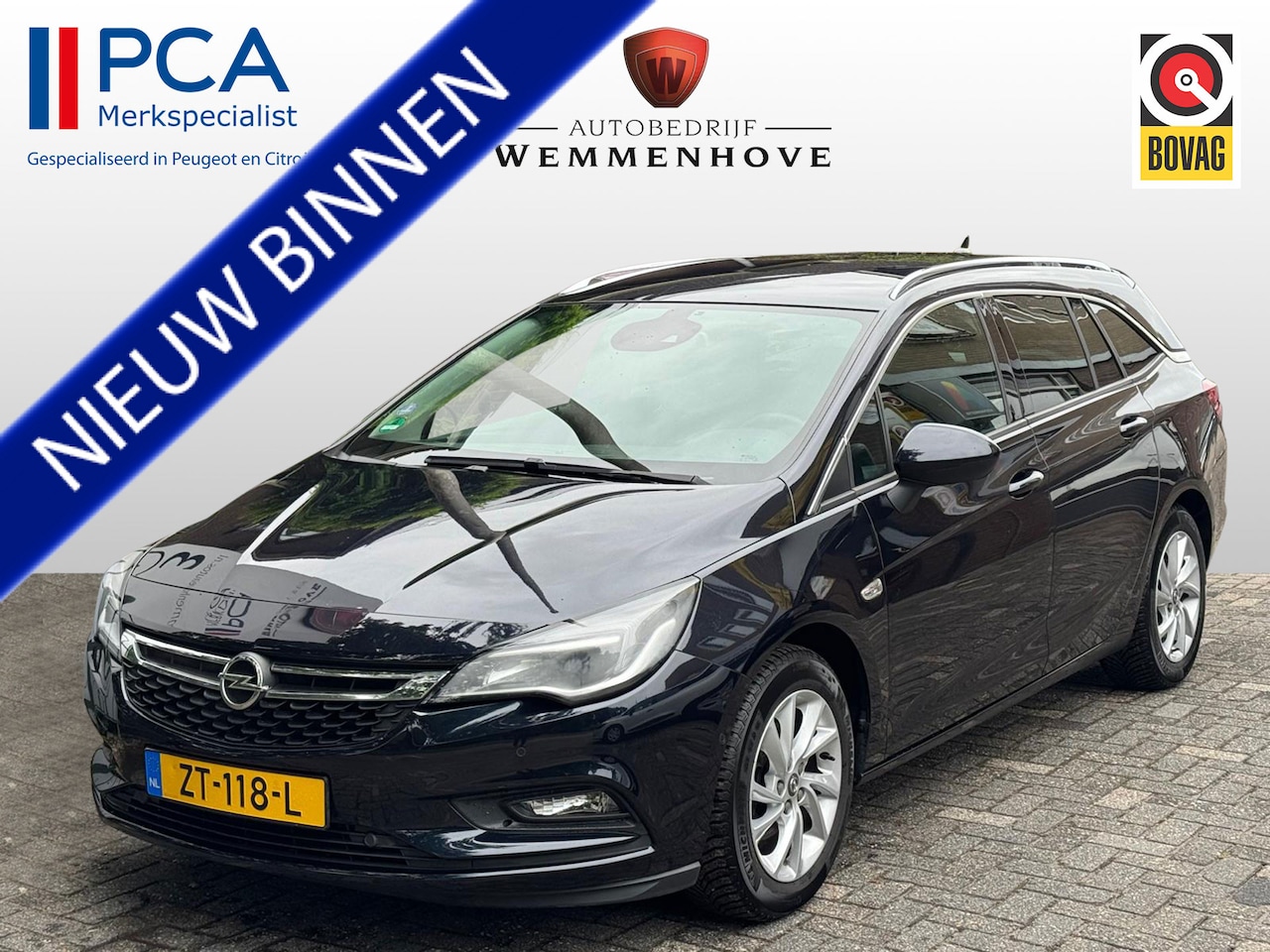 Opel Astra Sports Tourer - 1.0 Turbo Business Executive Airco/Stoelverw./Stuurverw./El.klep/Lichtmetalen velgen - AutoWereld.nl