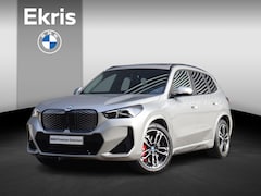 BMW iX1 - eDrive20 | M Sportpakket Pro | Panodak | Trekhaak | Driving Assistant Prof. | Head-Up | El