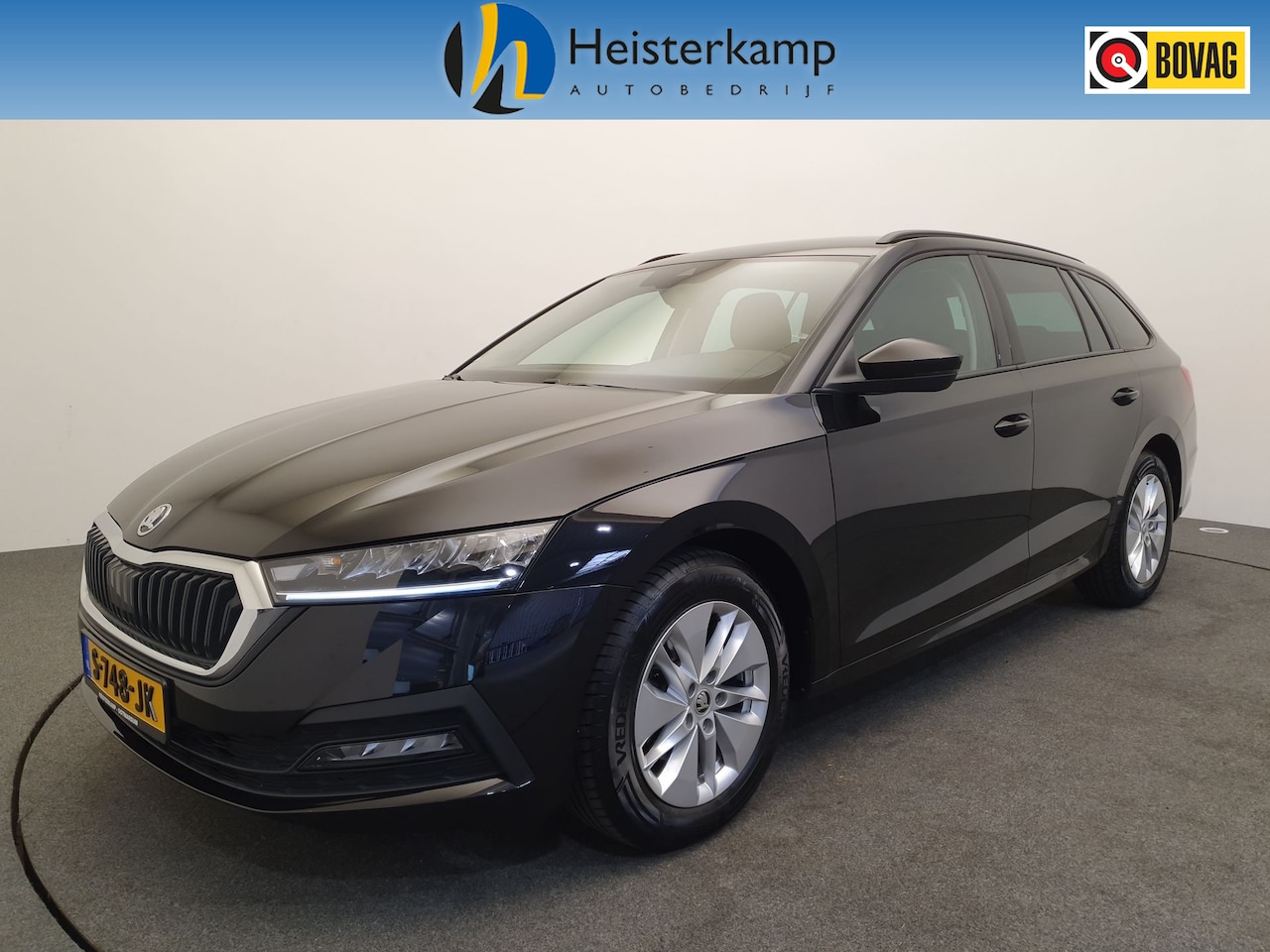 Skoda Octavia Combi - 1.5 e-TSI 150pk Business Edition Cruise control, PDC, Stoelverwarming - AutoWereld.nl