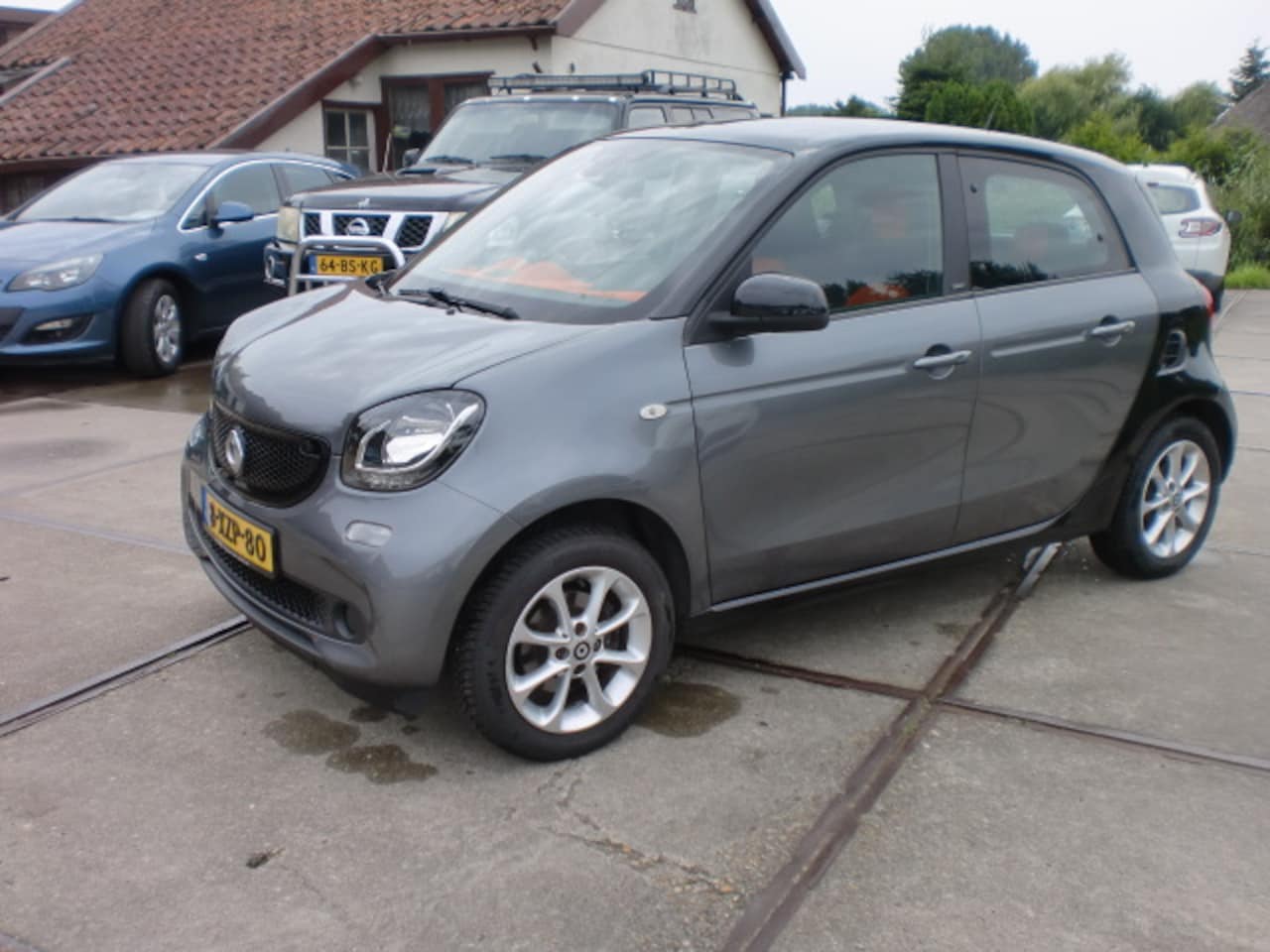 Smart Forfour - 1.0 52KW BJ2014 PASSION KM 114 AIRCO GRIJS - AutoWereld.nl
