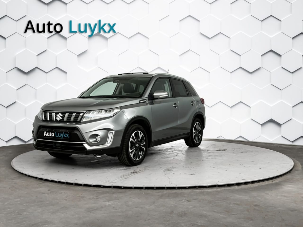Suzuki Vitara - 1.5 Hybrid Style Allgrip Automaat | Panoramadak | Adaptieve Cruise Control | Parkeercamera - AutoWereld.nl