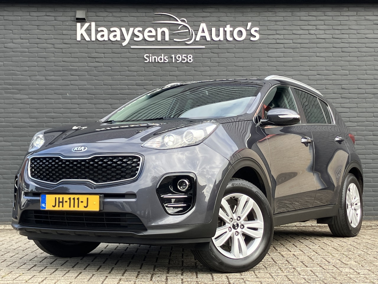 Kia Sportage - 1.6 GDI First Edition | navigatie | trekhaak 1400 kg | cruise control | camera | parkeerse - AutoWereld.nl