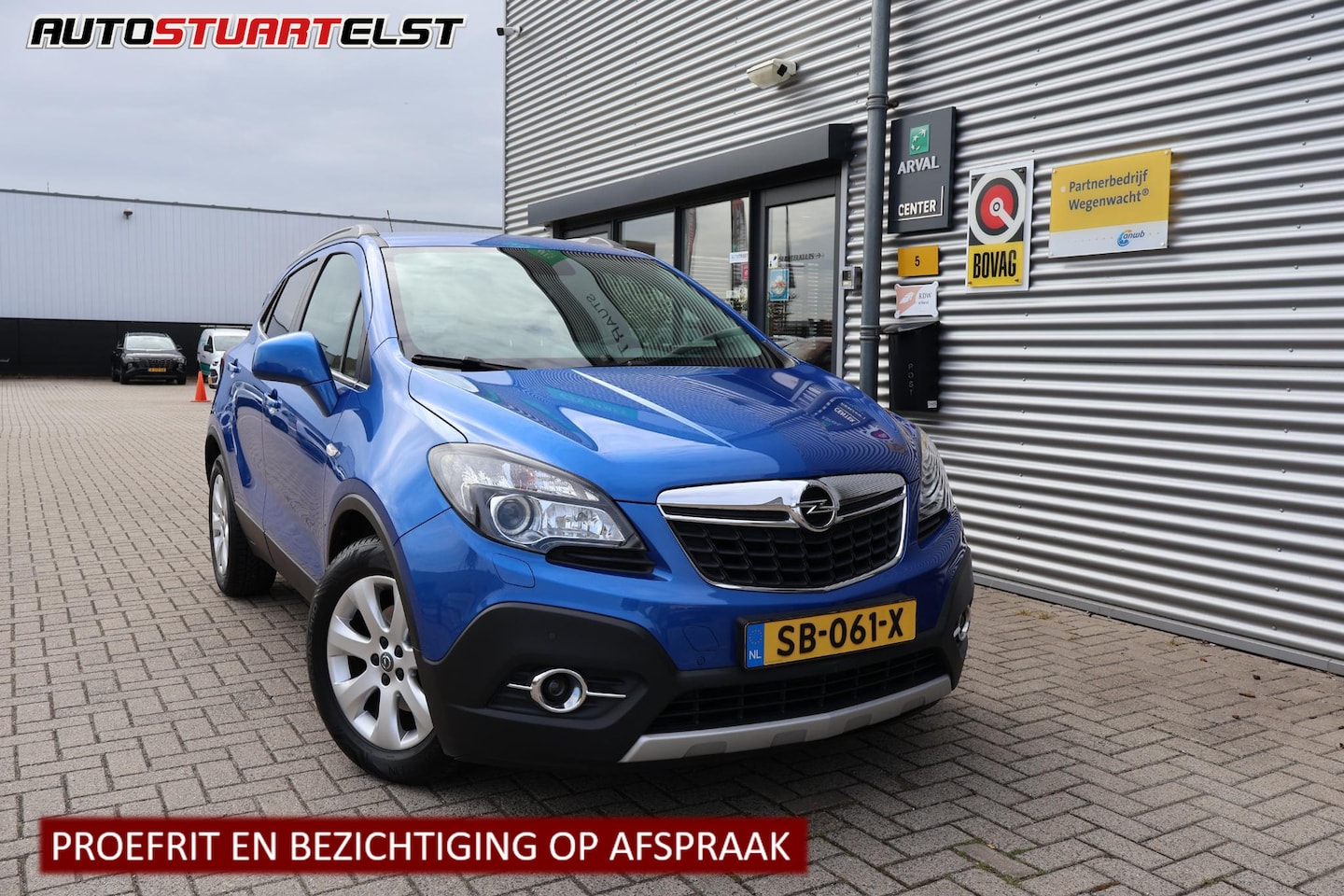 Opel Mokka - 1.4 T Cosmo WinterPack | Navi | Trekhaak | PDC | Airco | Cruise | Climate | NL-Auto | Voll - AutoWereld.nl