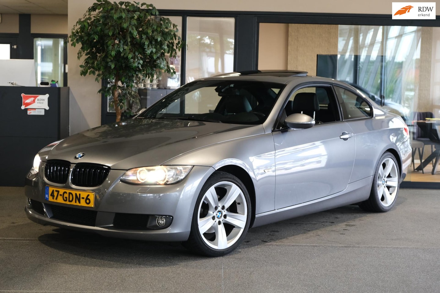 BMW 3-serie Coupé - 320i High Executive AUT Dak Navi Leder Xenon Pdc Cam Cruise - AutoWereld.nl