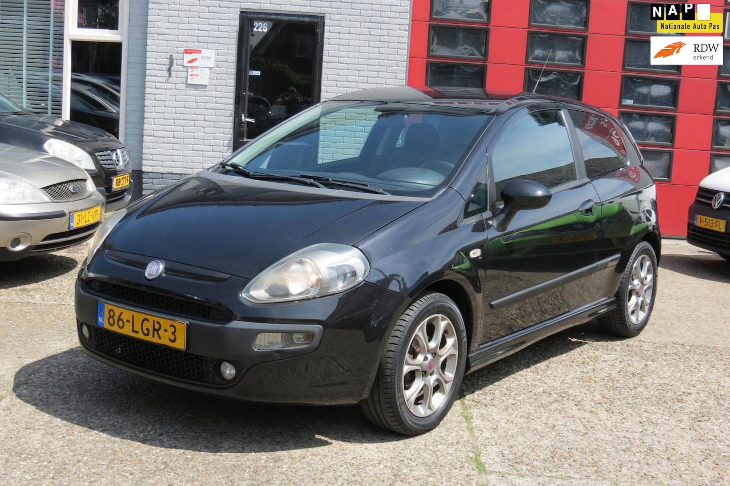 Fiat Punto Evo - 1.4 Racing . Airco, groot Scherm, , LM VELG - AutoWereld.nl