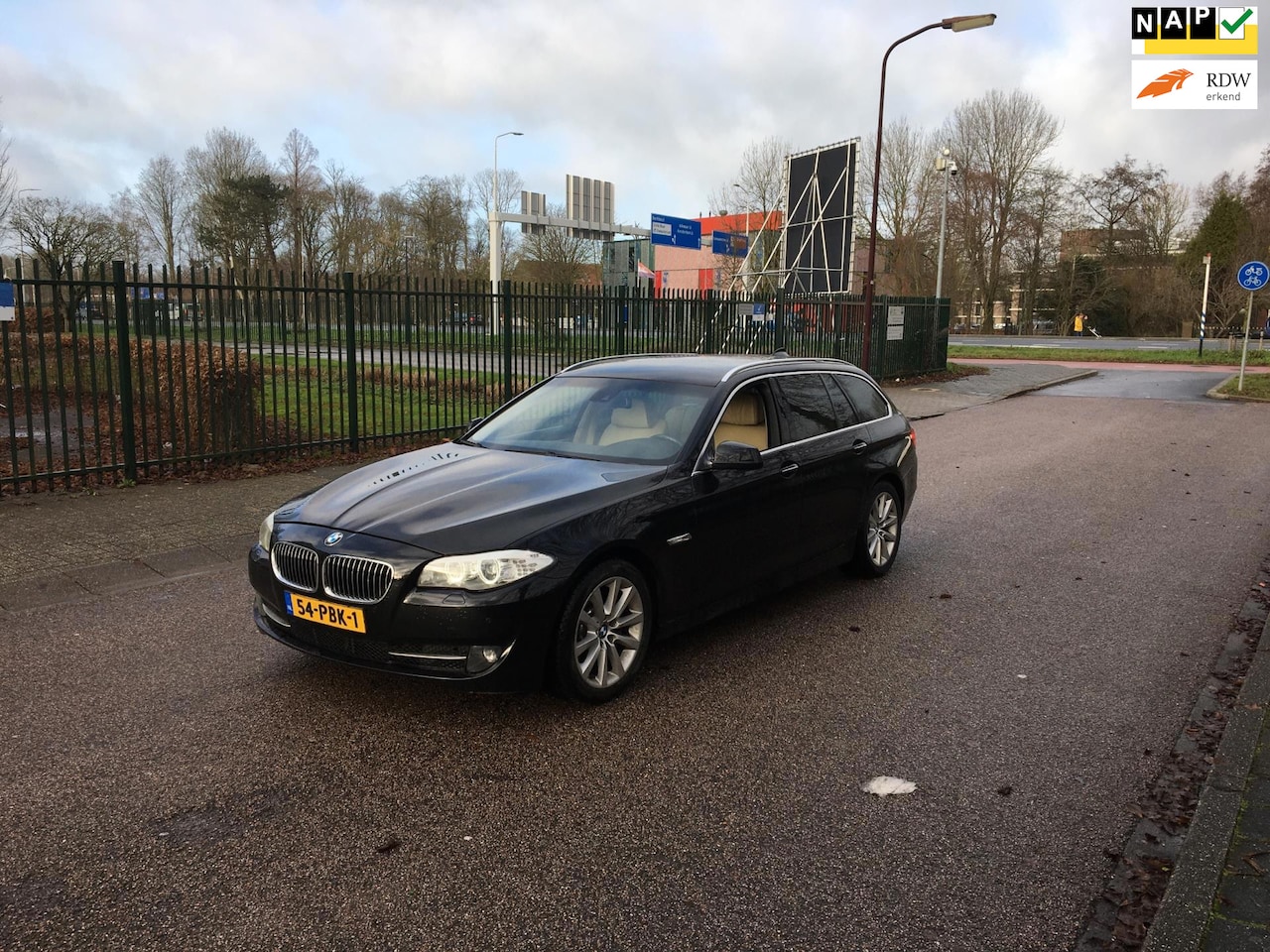 BMW 5-serie Touring - 525d High Executive. Motor tikt - AutoWereld.nl
