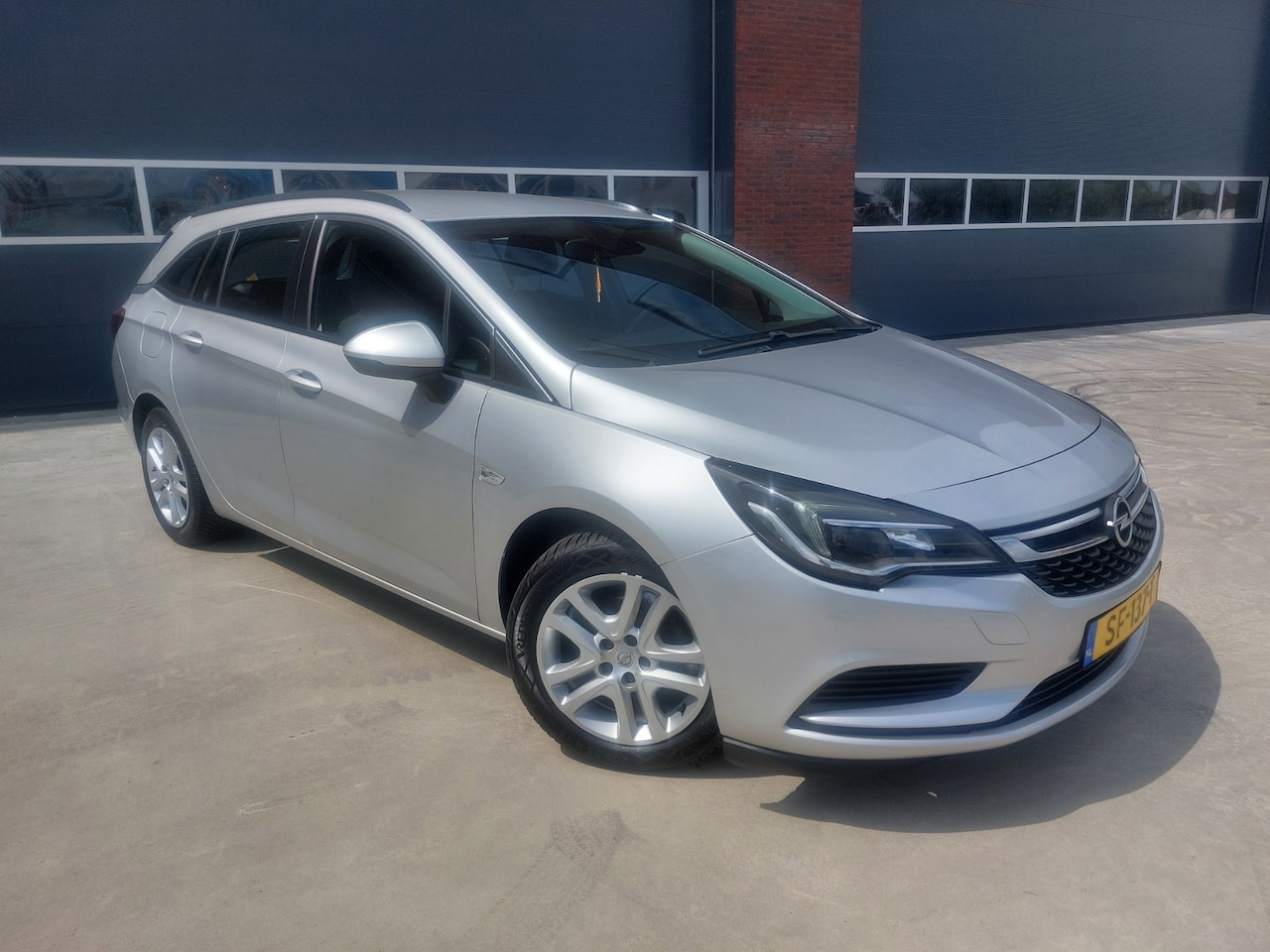 Opel Astra Sports Tourer - 1.6 CDTI Business+Airco/Navigatie 3-2018 - AutoWereld.nl