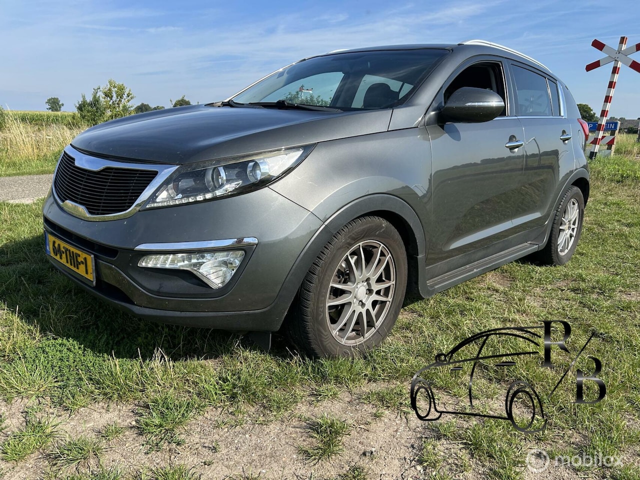 Kia Sportage - 2.0 CRDI X-ecutive Plus Pack NAVI AIRCO CRUISE - AutoWereld.nl
