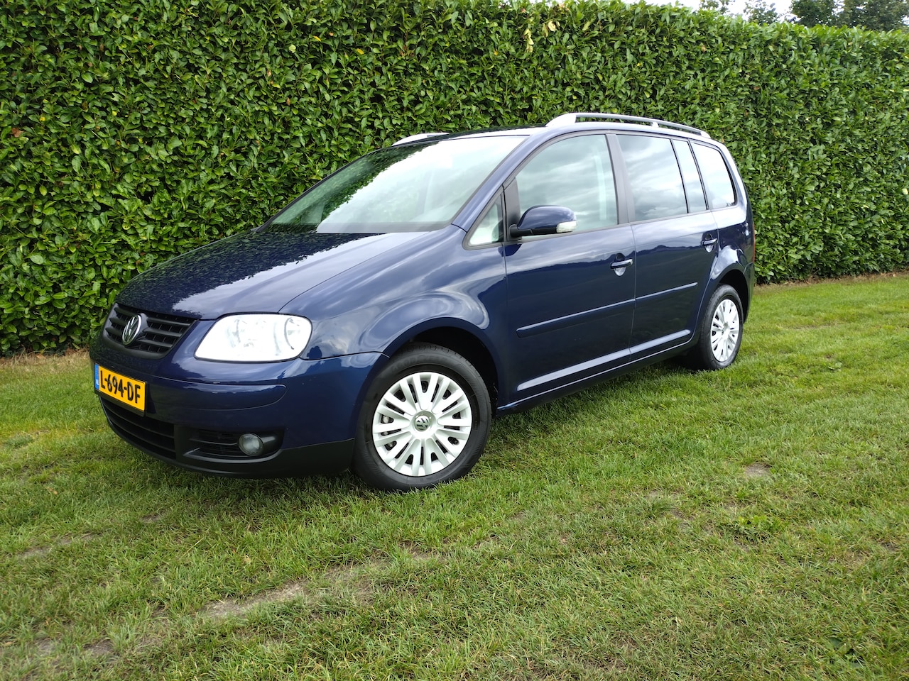 Volkswagen Touran - 1.6-16V FSI Zitplaatsen: 7 - AutoWereld.nl