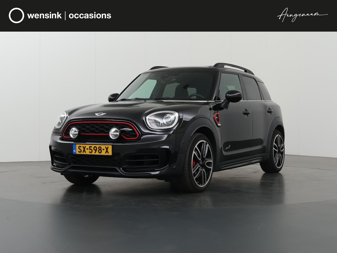 MINI Countryman - Mini 2.0 John Cooper Works ALL4 Chili | Panoramadak | Harman/Kardon Audio | Sportstoelen | - AutoWereld.nl
