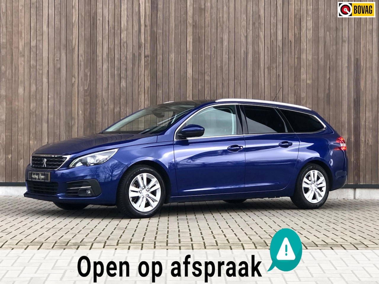 Peugeot 308 SW - 1.2 PureTech Blue Lease Premium|PANO|360| - AutoWereld.nl