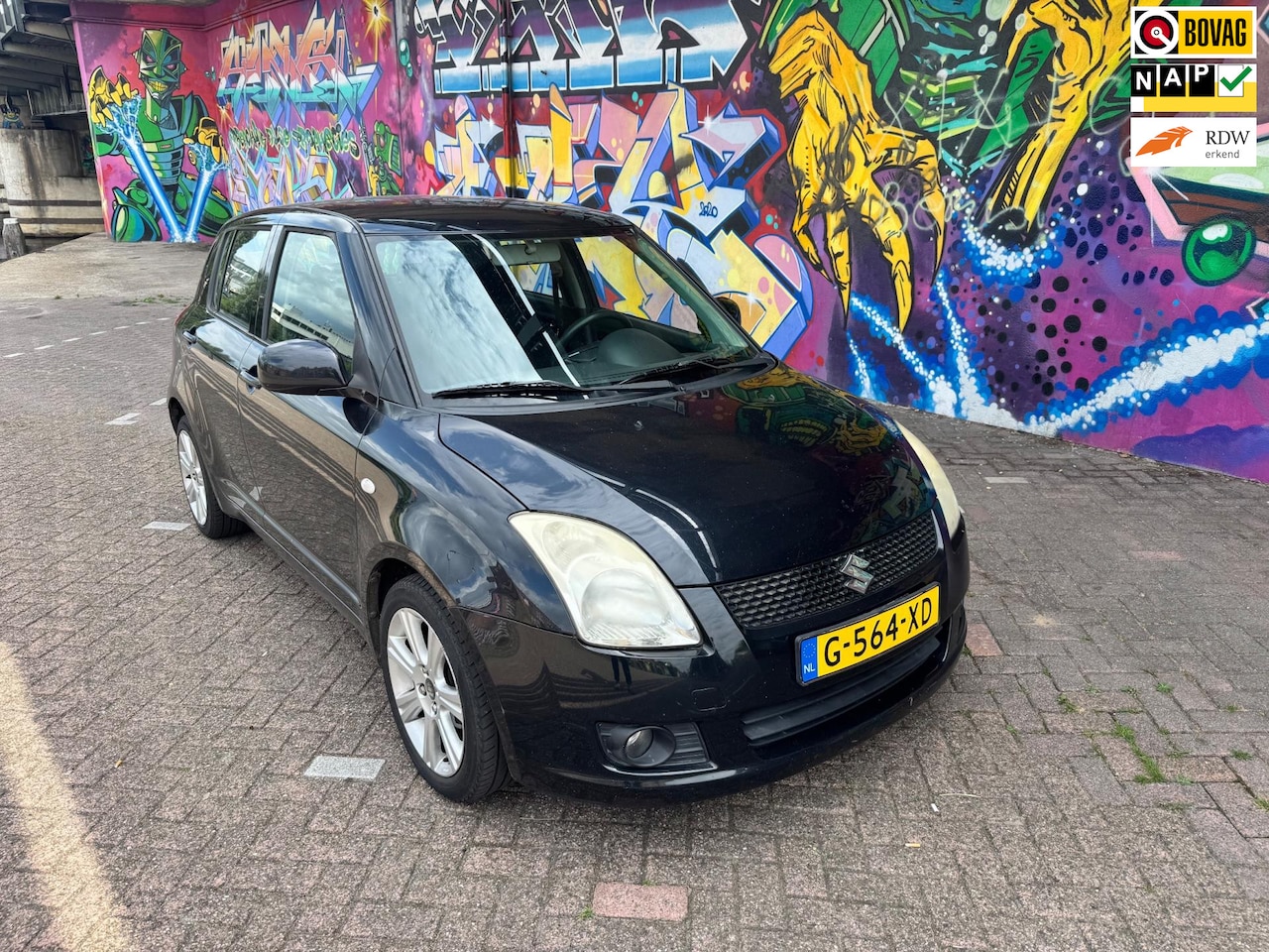 Suzuki Swift - 1.3 Base digitale airco sport velgen navigatie 5 deurs zeer leuke auto lage km stand bj 20 - AutoWereld.nl