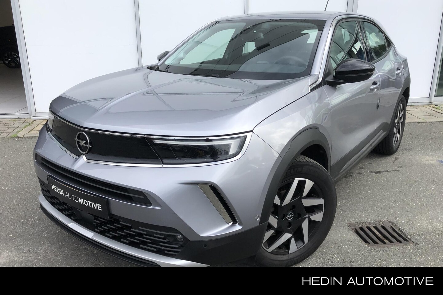 Opel Mokka - 1.2 130pk Elegance AUTOMAAT | Unieke km-stand! | Trekhaak | Climate control | Parkeersenso - AutoWereld.nl