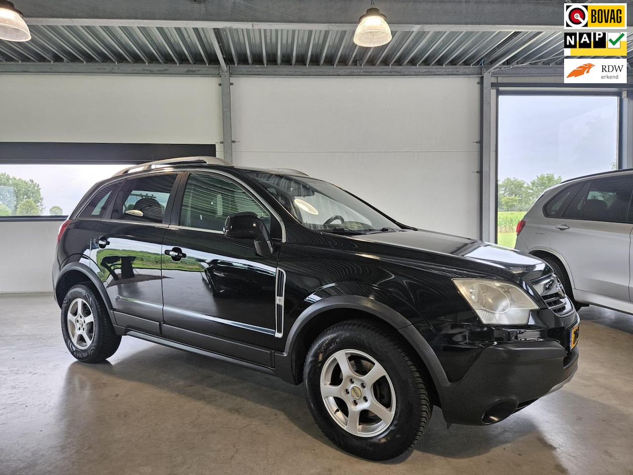 Opel Antara - 2.4-16V Temptation pdc, climate controle/ telefoon! - AutoWereld.nl
