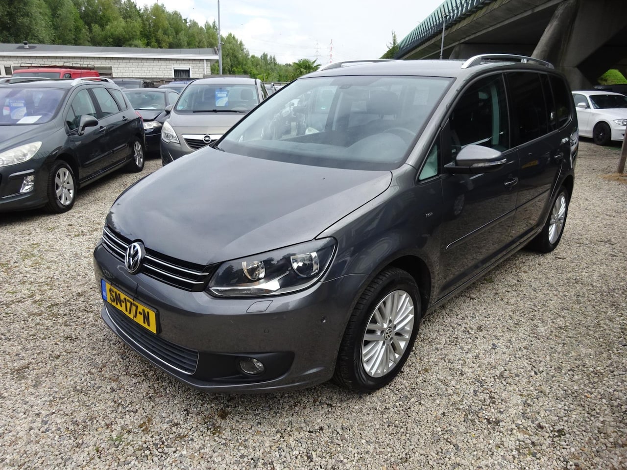 Volkswagen Touran - 1.4 TSI Comfortline 7p. airco cruise control navi - AutoWereld.nl
