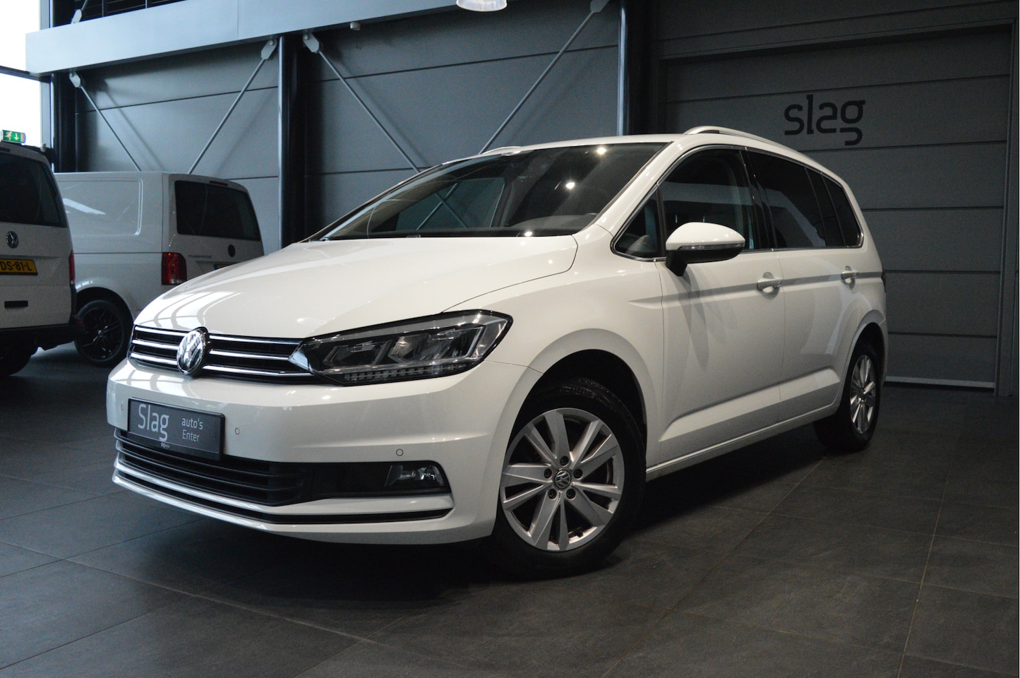Volkswagen Touran - 1.5 TSI Highline navi clima cruise led pdc 150 pk !! - AutoWereld.nl